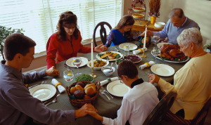 Family Praying Before Dinner ca. 2001